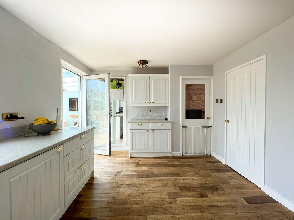 Kitchen leading into Conservatory