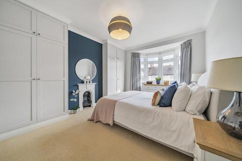 8 Charminster Avenue, London, SW19 3EL