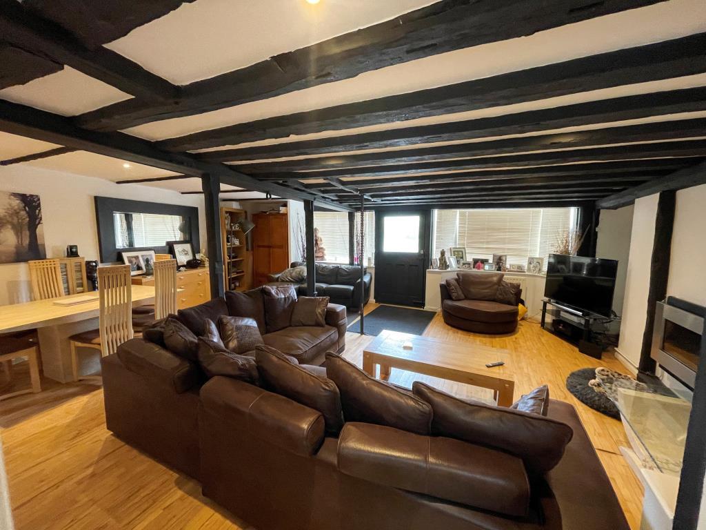 Living room with exposed beams