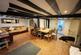 Living room with exposed beams