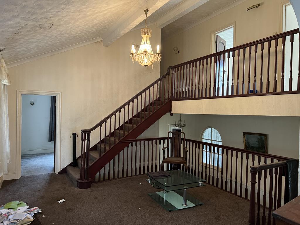 Entrance hall with bedroom and stairs leading to o