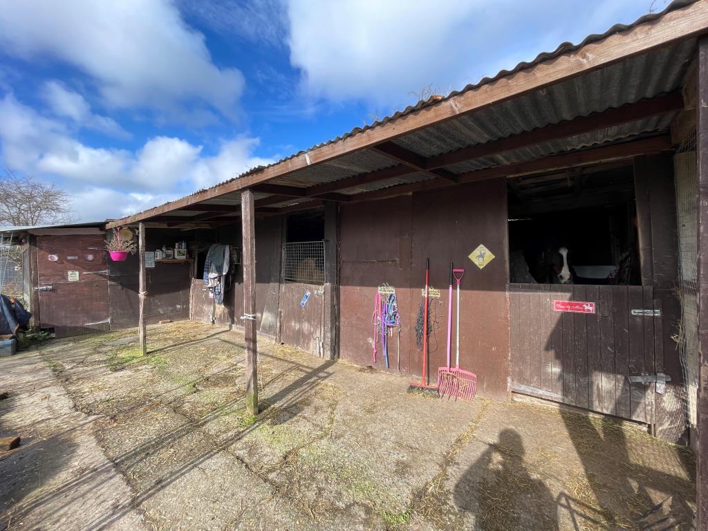 Four stables and tack room