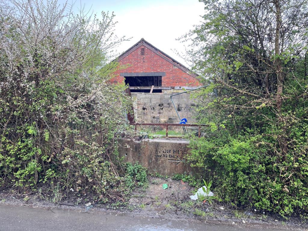 View of diused dairy building from Mill Road