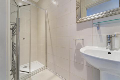 93 Dorking Road, Epsom, KT18 7JU