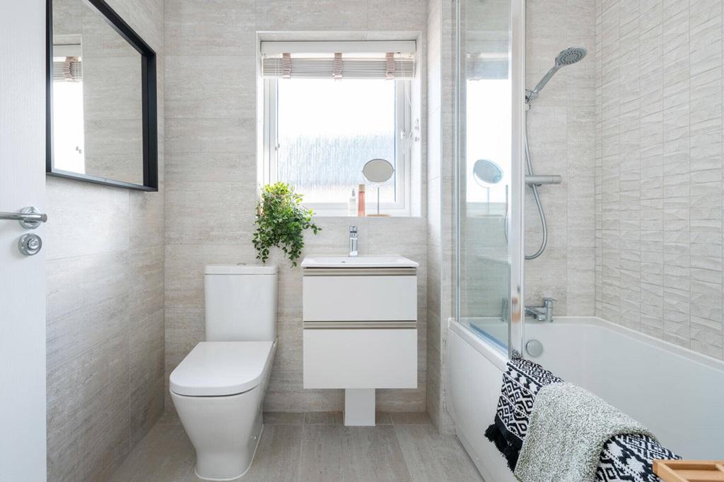 A family bathroom completes the home