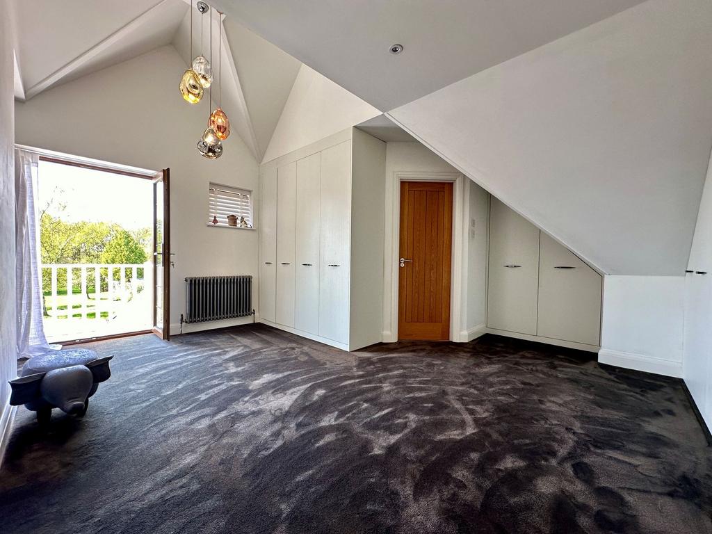Dressing area to en-suite with balcony