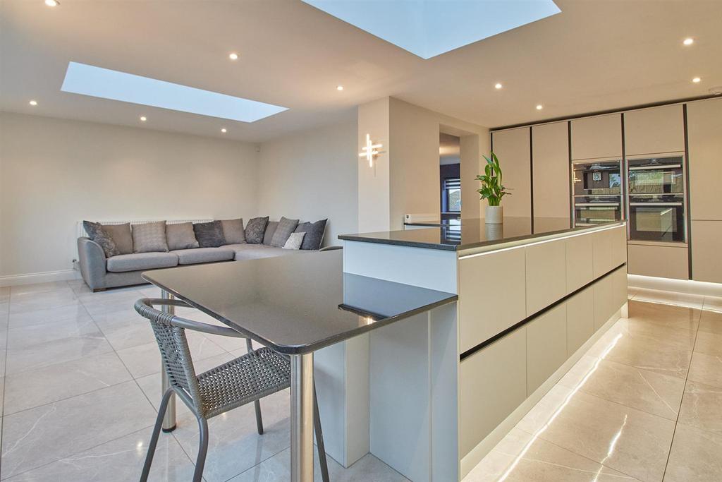 L shaped extended and refitted open plan living di