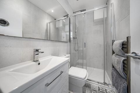 2 Bridges Road, London, SW19 1EN