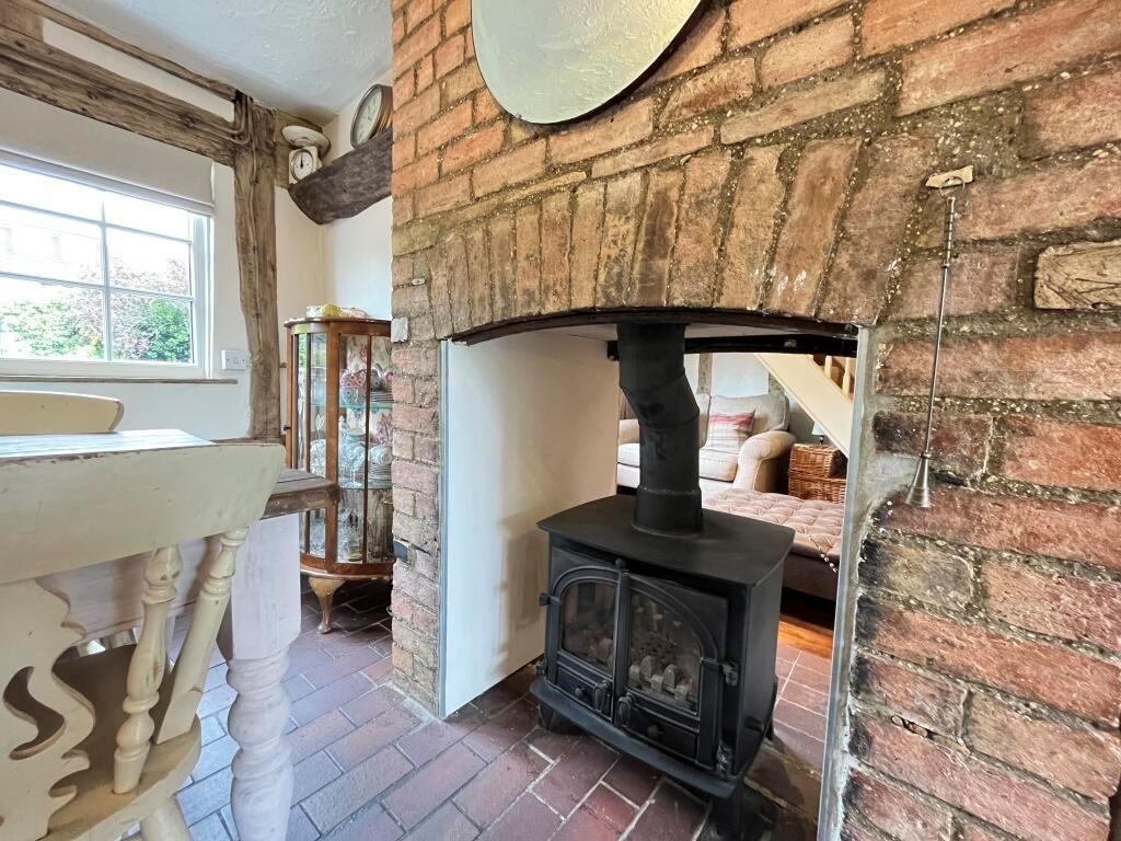 Feature wood burner 116.