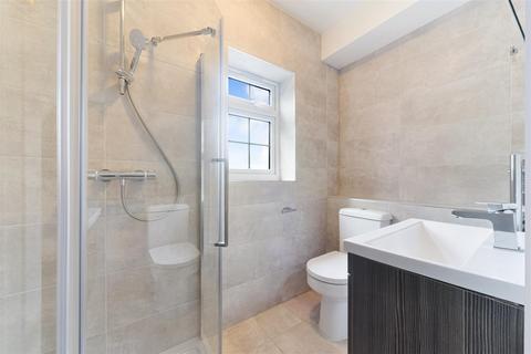 2 Chase Road, Epsom, KT19 8TL