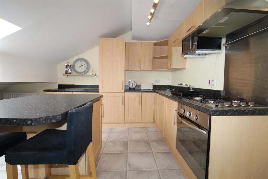 Open plan living room/kitchen