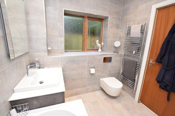 En suite bath &amp; shower room