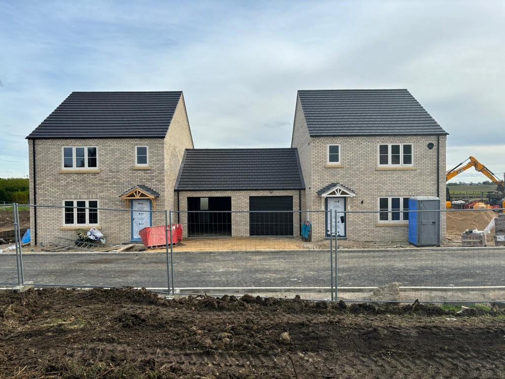 Plot 9 is the property on the left