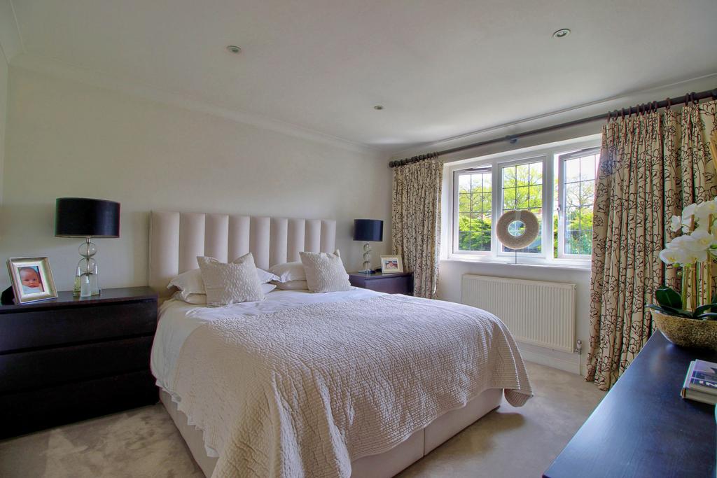 Master Bedroom with fitted wardrobes and en-suite