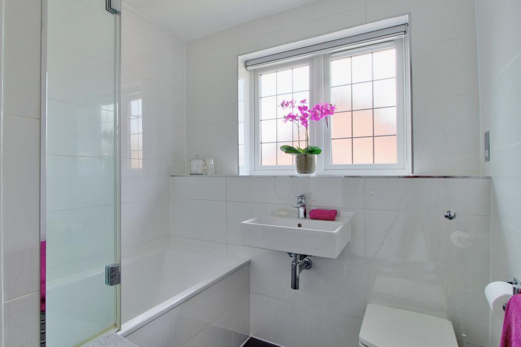 Family Bathroom has linen cupboard