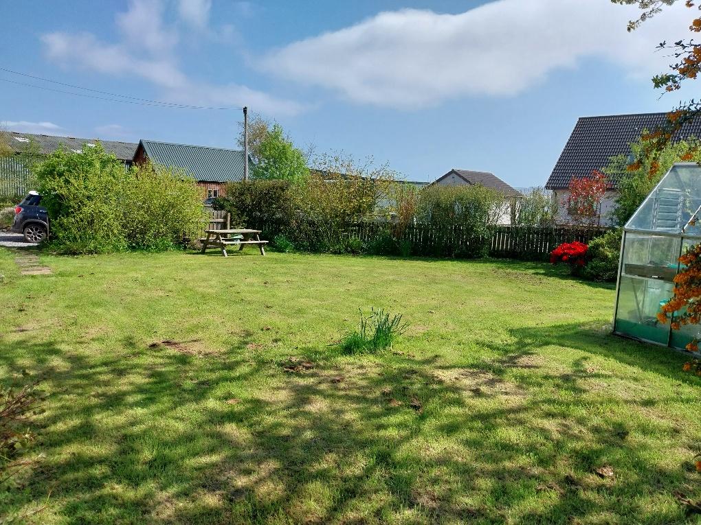 Gardens located to front of property