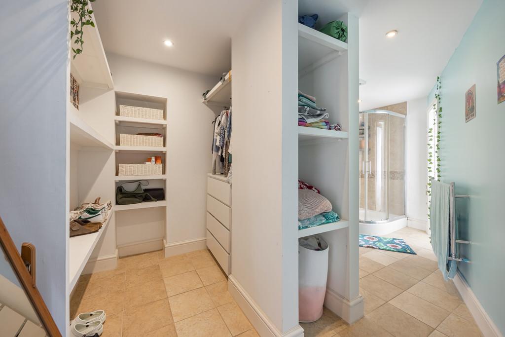 Walk in wardrobe to ensuite shower room