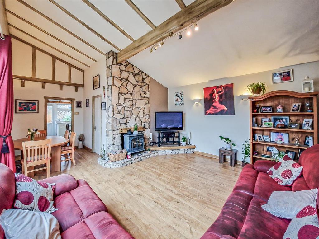 Living dining room with vaulted ceiling