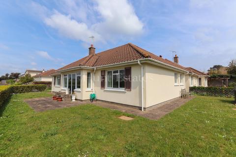 2 bedroom semi-detached bungalow for sale, La Grande Route Des Sablons, Grouville, Jersey. JE3 9FQ