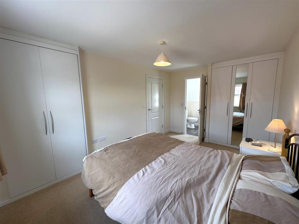 Bedroom One With Extensive Fitted Wardrobes &amp; En S