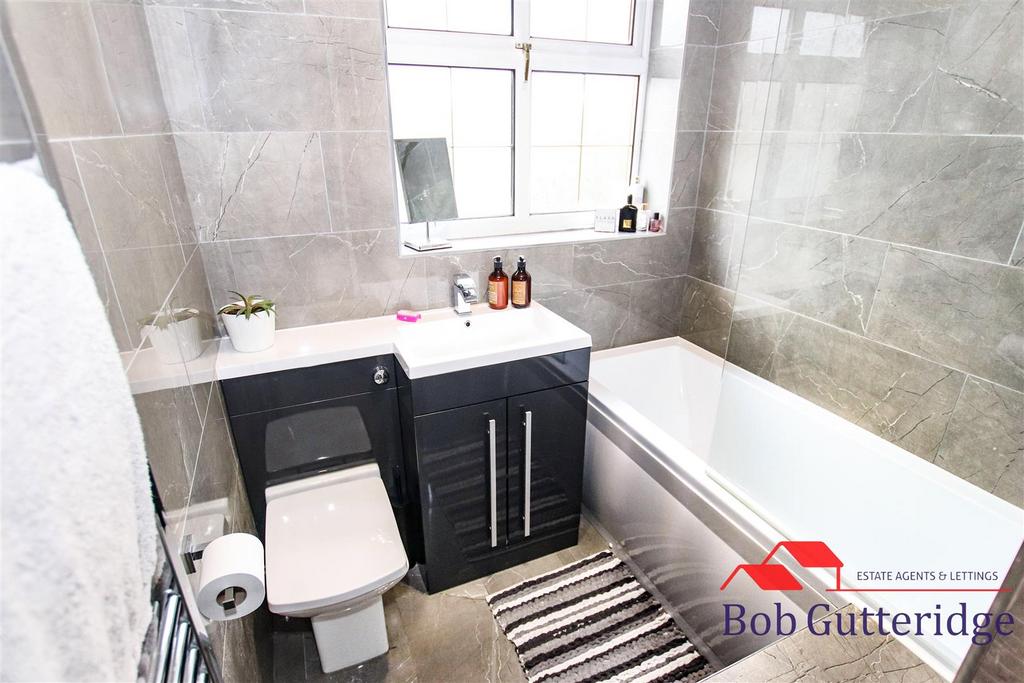 First floor fully tiled bathroom