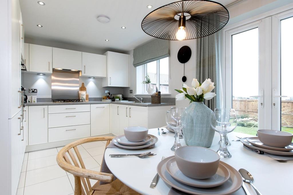 The kitchen/dining area provides a sociable space