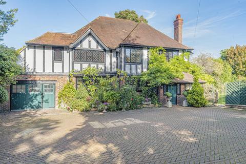 8 Higher Drive, Banstead, SM7 1PF