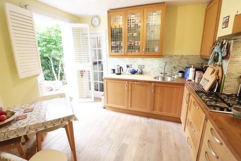 1 Dinton Road, London, SW19 2AR