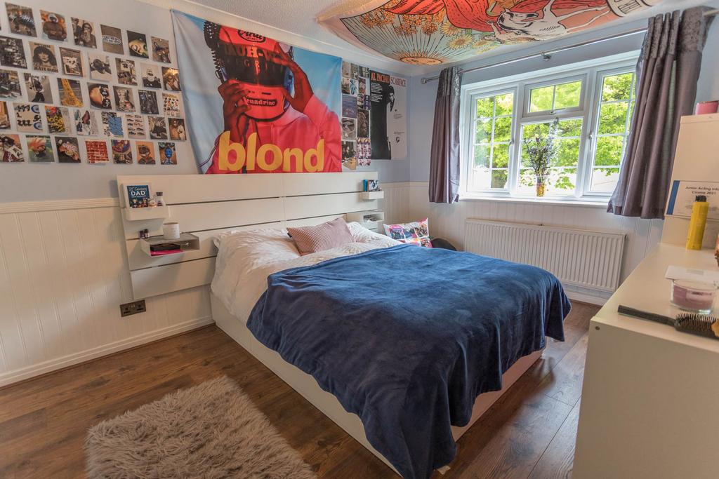Bedroom 2 with wardrobes