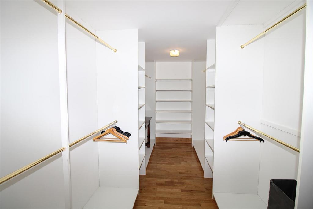 Bedroom one walk in wardrobe.jpg