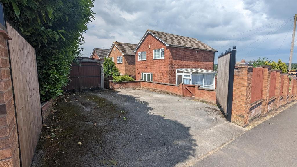 Rear Drive and Garage