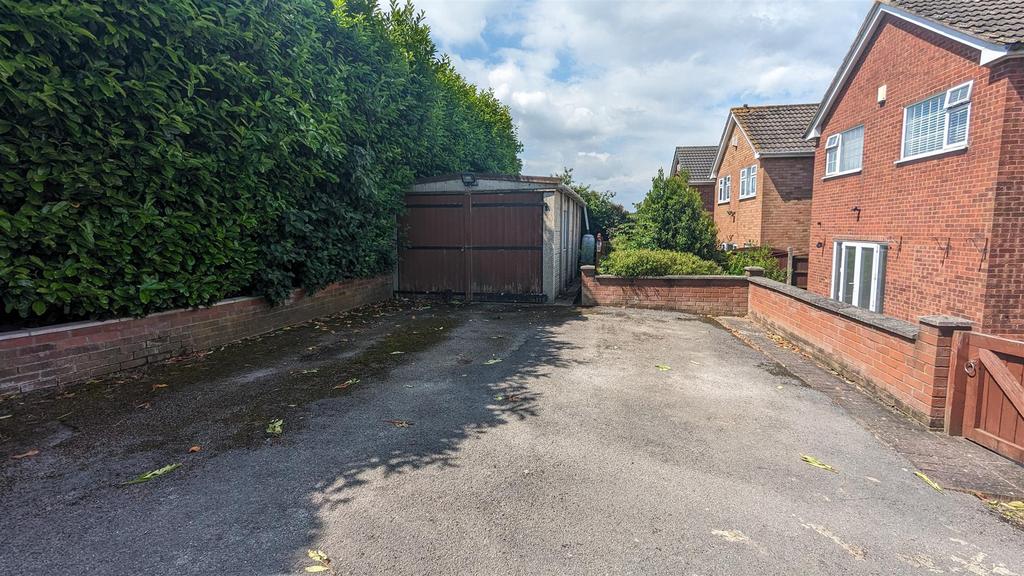 Rear Drive and Garage