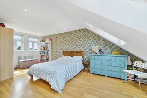 103 Adela Avenue, New Malden, KT3 6LG