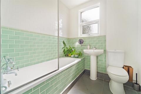 103 Adela Avenue, New Malden, KT3 6LG