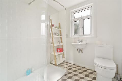103 Adela Avenue, New Malden, KT3 6LG