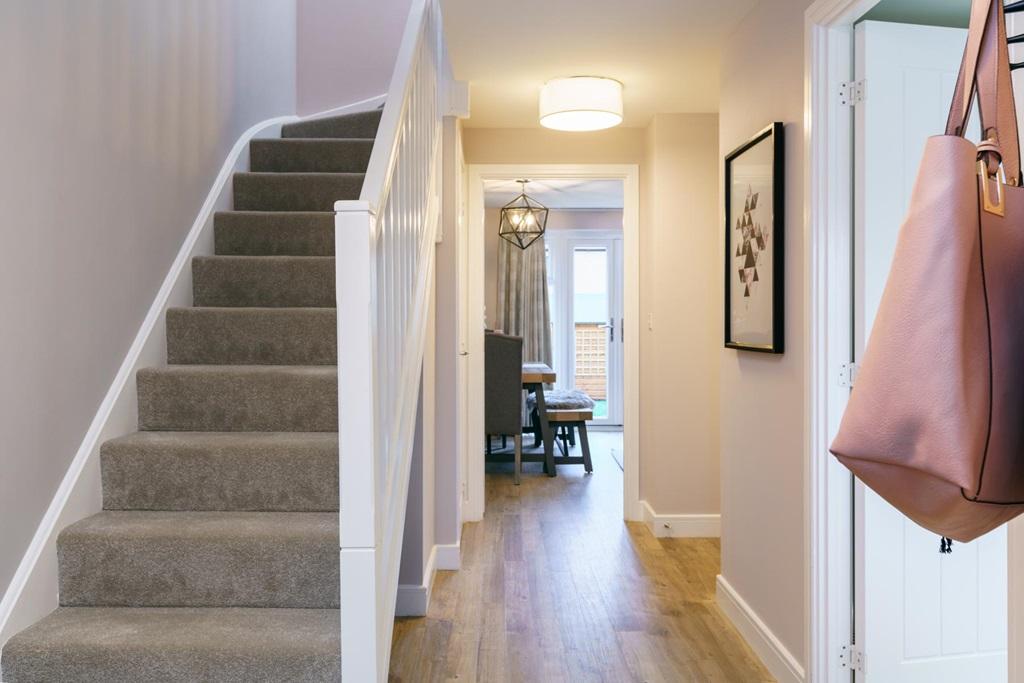 Hallway with under stairs storage