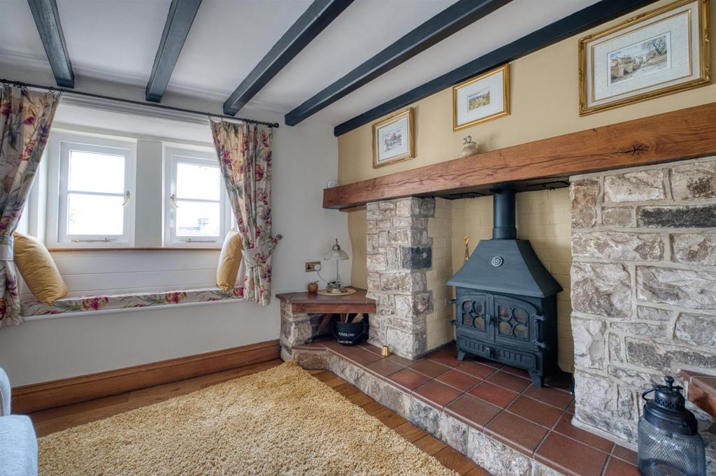 Dining Room - fireplace and window seat.jpg
