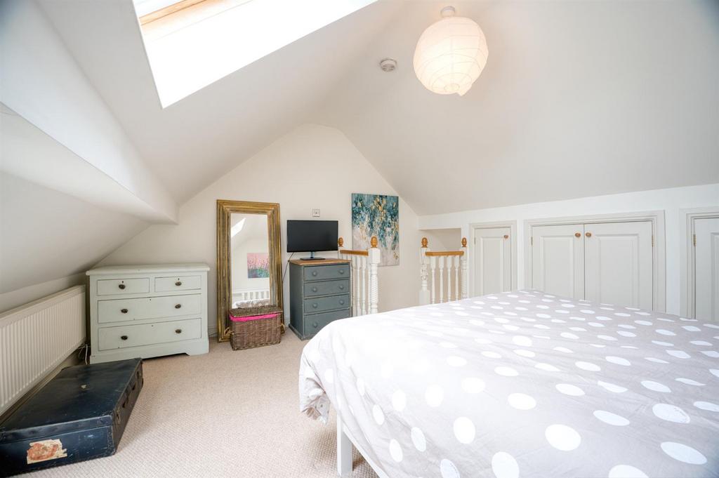 Bedroom Three to stairs.jpg