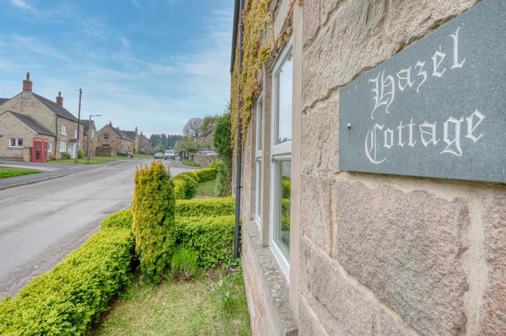 Hazel Cottage sign and towards Barley Mow.jpg