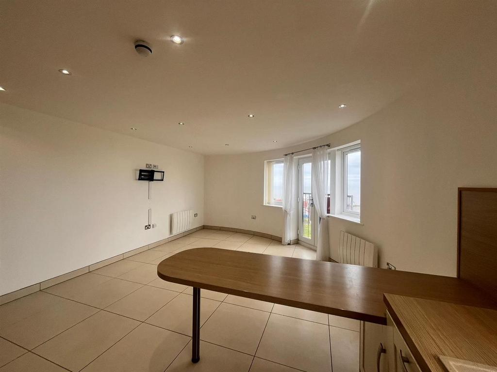 Living room with kitchen area