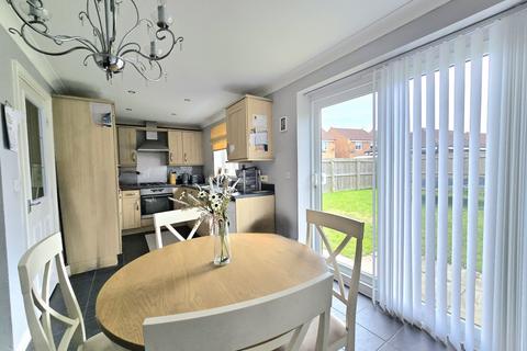 15 Rothbury Drive, Ashington, NE63 8TJ