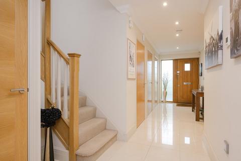 2 Thomas More Gardens, Esher, KT10 8EW