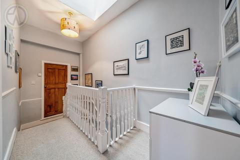 66 Briscoe Road, London, SW19 2AQ