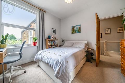 66 Briscoe Road, London, SW19 2AQ