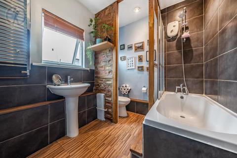 66 Briscoe Road, London, SW19 2AQ