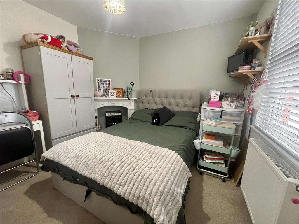 Bedroom 3/ front sitting room