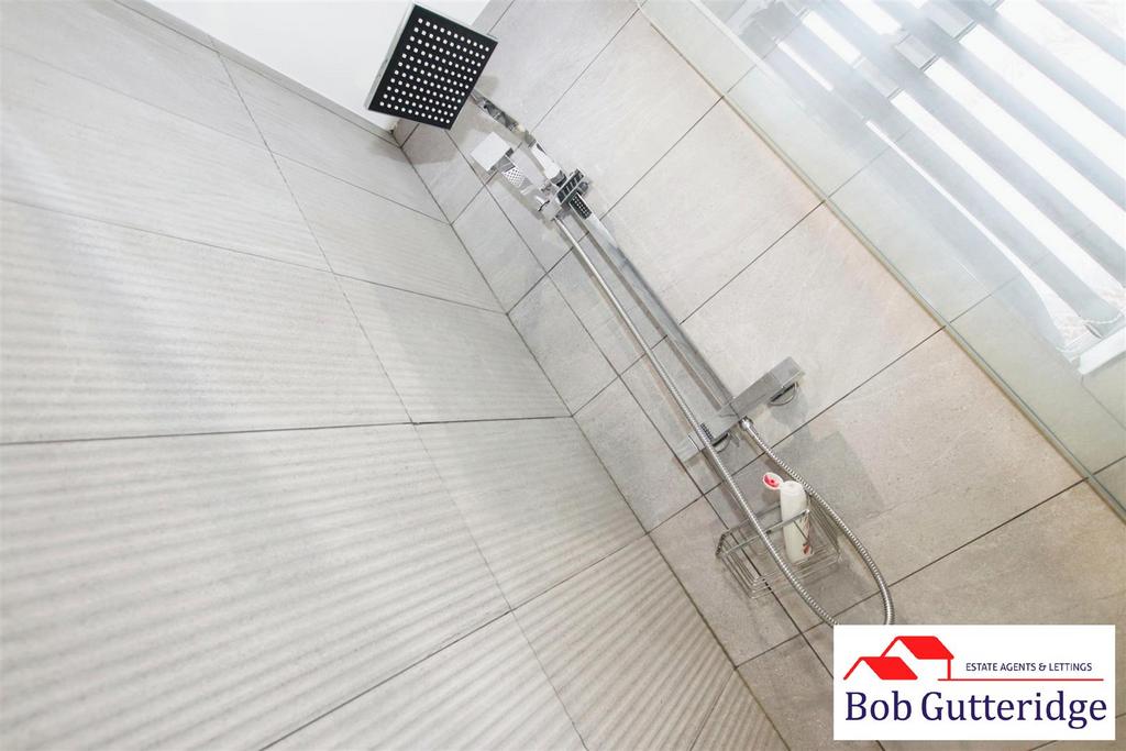 Luxury fully tiled shower room