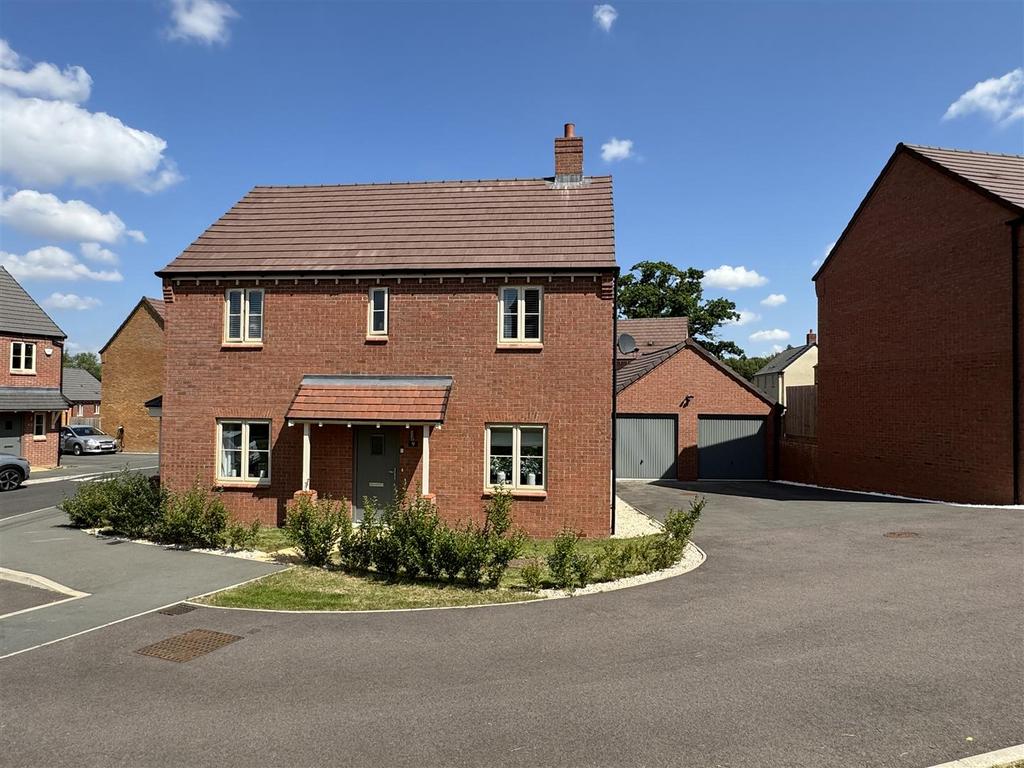 Front aspect with double garages