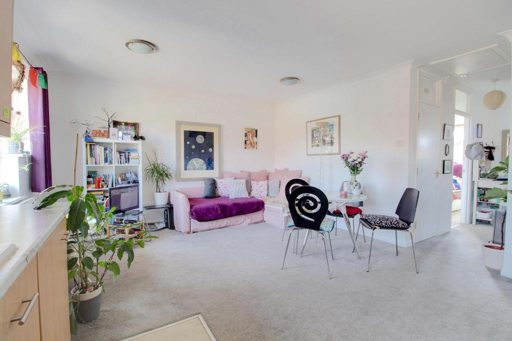 Large open plan kitchen lounge diner with a well a