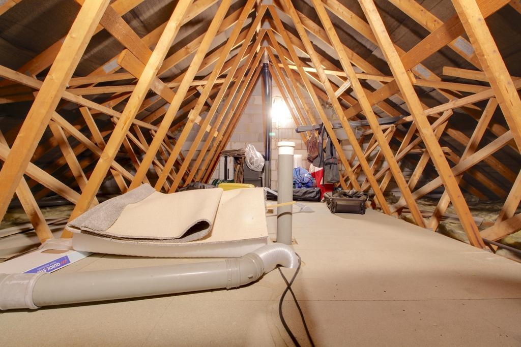 Large loft part boarded with ladder access and pot